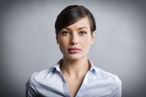 'woman thinking about oral cancer'