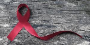 oral cancer ribbon on a wood table