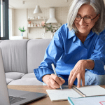 woman making an appointment for full-arch dental implants